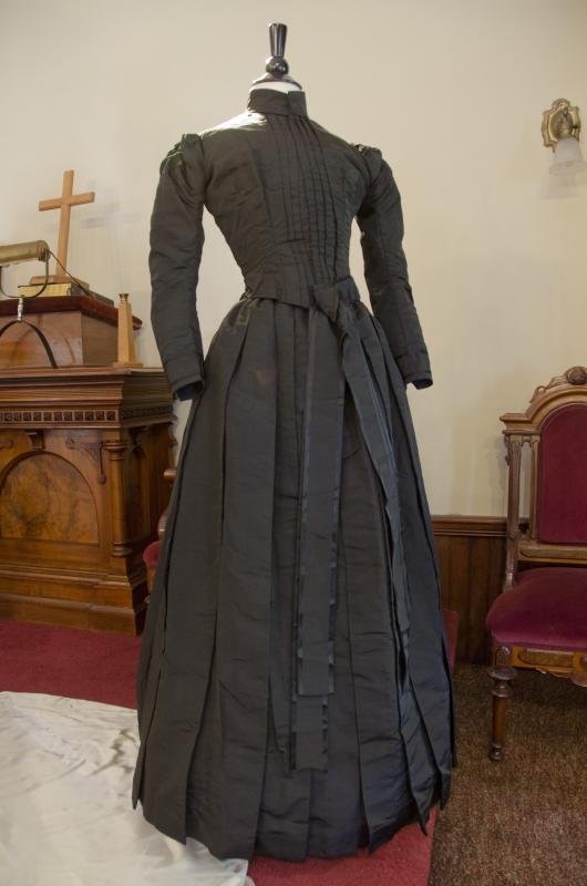 An 1885 wedding dress worn by Lucy (Mendell) Rounseville sparked the idea for the exhibit. BY GEORGIA SPARLING
